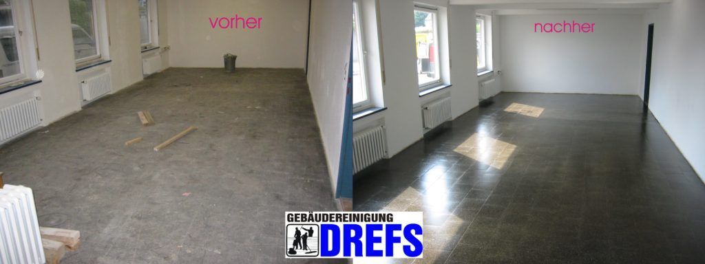 Leerer beigefarbener Raum mit dunklem Boden und großen Fenstern, durch die Sonnenlicht hereinfällt.