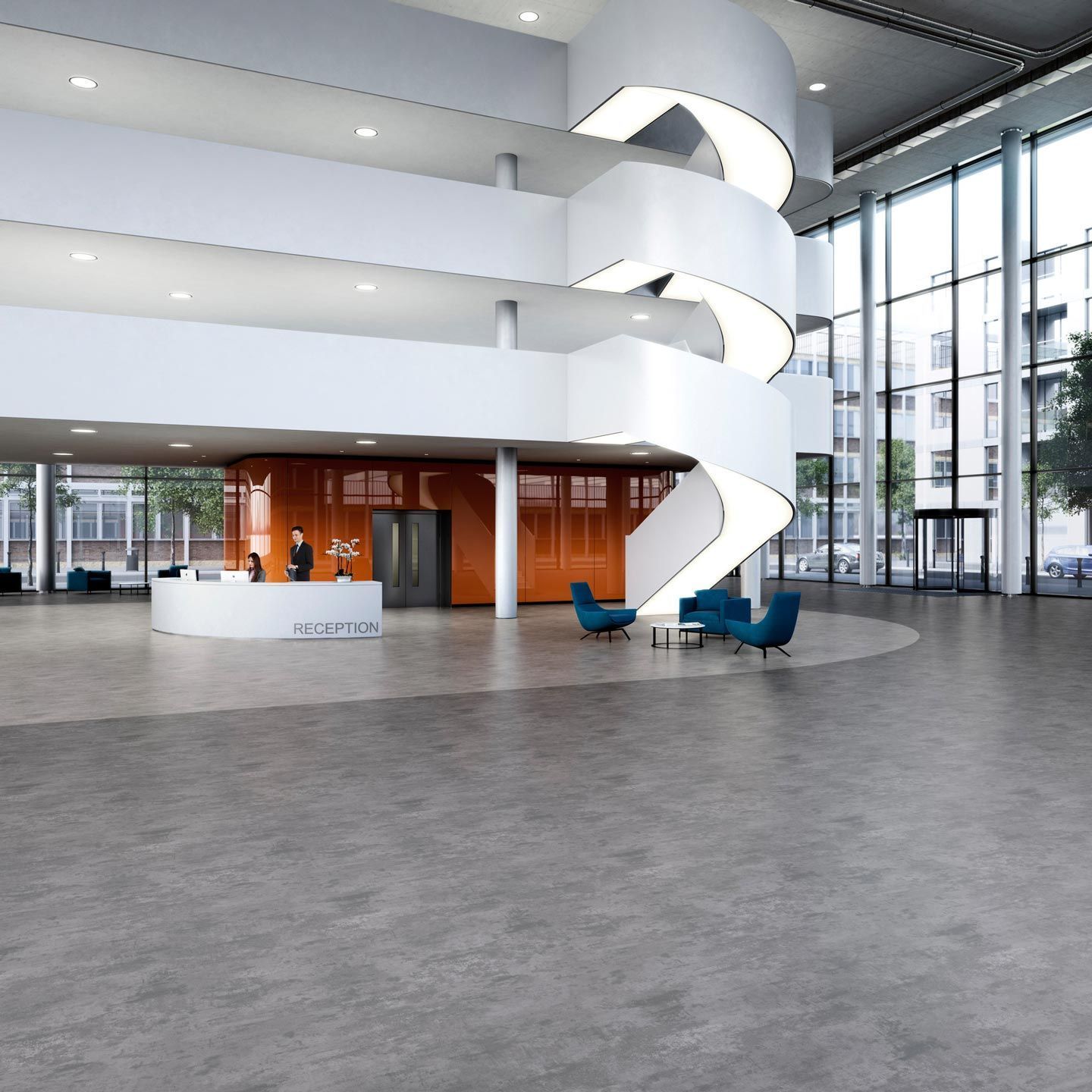 Eine große Lobby mit Wendeltreppe und Rezeption