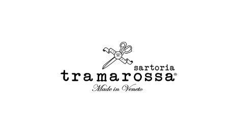 Logo pour Tramarossa, une marque de vêtements, avec un dessin de ciseaux et le texte « Fabriqué en Vénétie ».