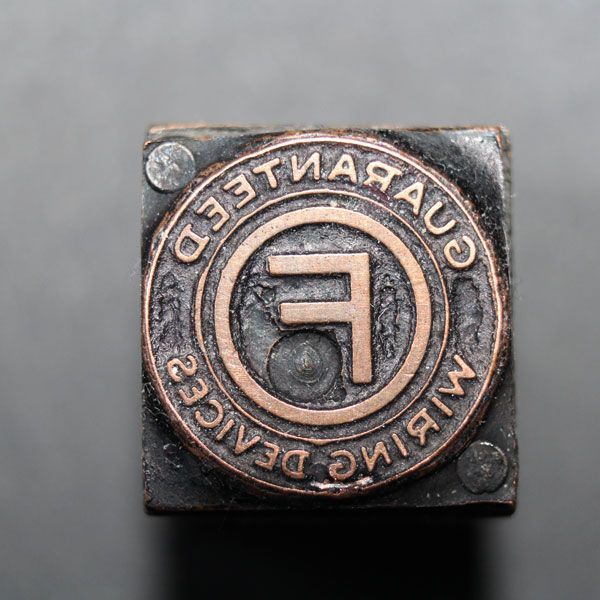 Unterseite eines eisernen Stempels