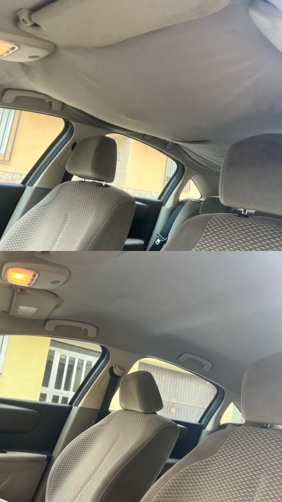 Una imagen del interior de un automóvil que muestra el techo y los asientos.