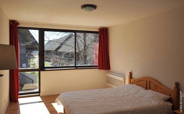 Studio vue chambre avec baie vitrée