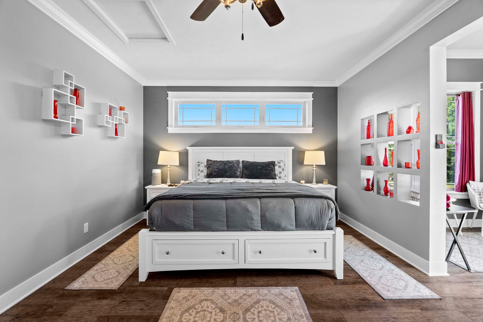 Beautifully styled luxury bedroom with warm ambient lighting