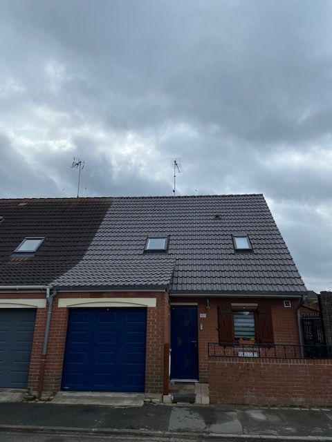 Maison avec fenêtres de toit