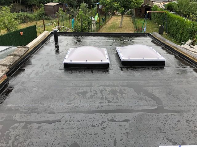 Toit-terrasse avec lucarnes