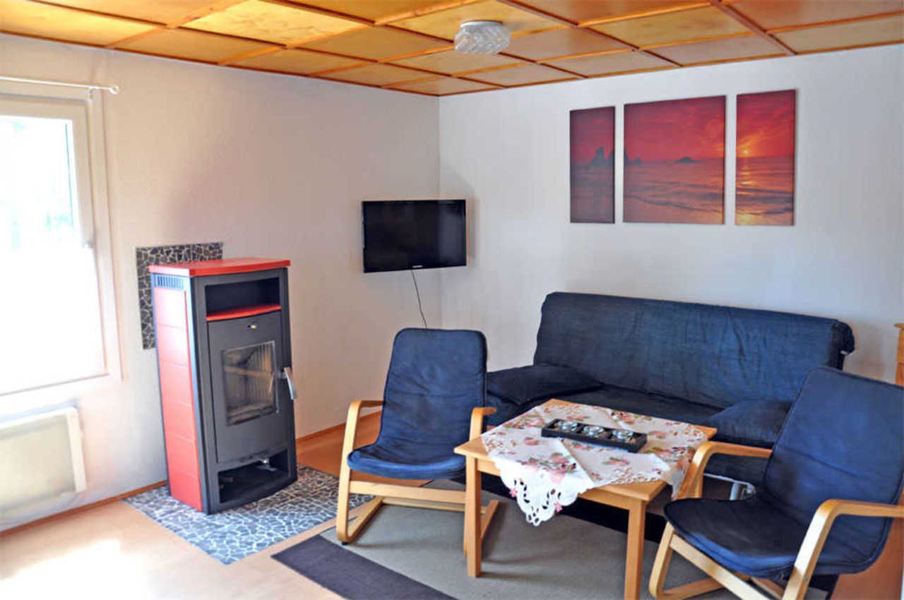 Bungalow 1 | Wohnbereich mit Kamin