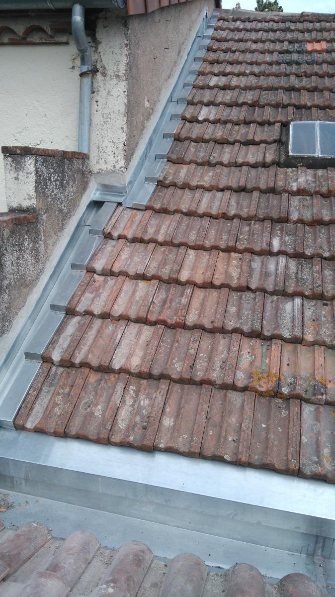 Pose d'éléments de zinguerie