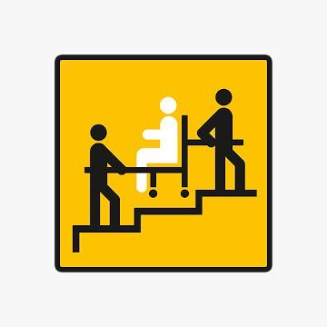Ein Mann schiebt einen Rollstuhl eine Treppe hinauf.