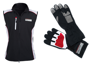 Eine schwarze Weste und ein Paar Handschuhe auf weißem Hintergrund