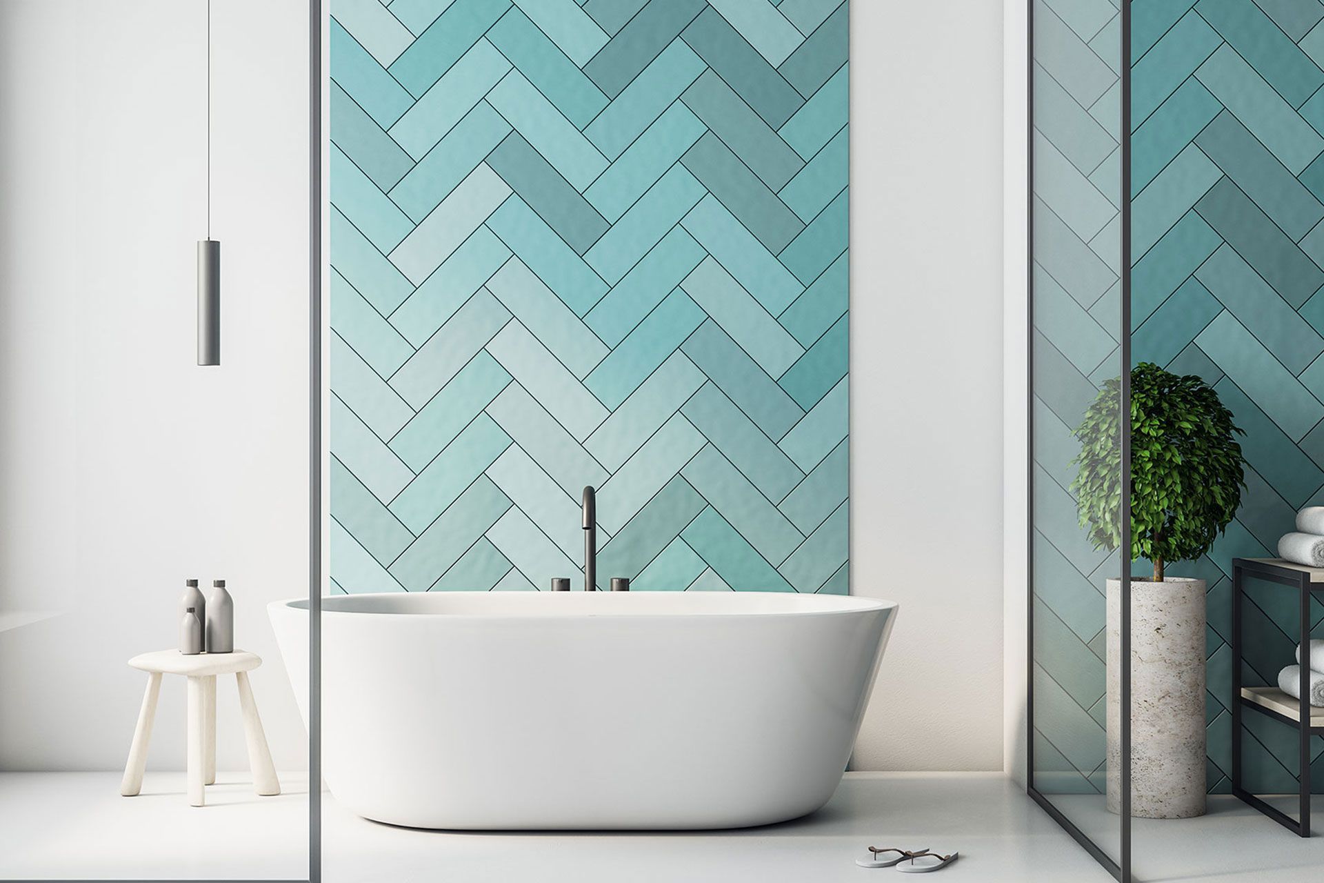 Modernes Badezimmer mit weißer Badewanne und türkisfarbenen Fliesenspiegel in Fischgrätmuster