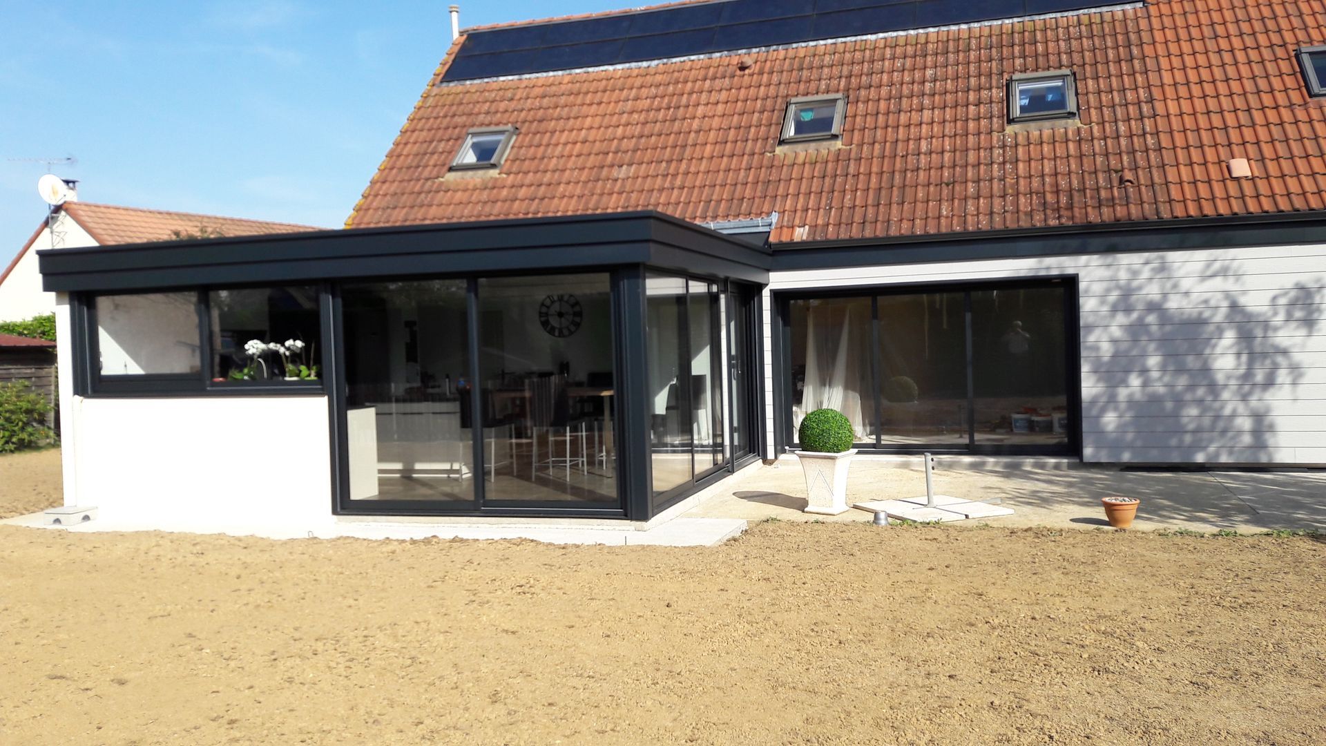 Véranda en extension d'une maison