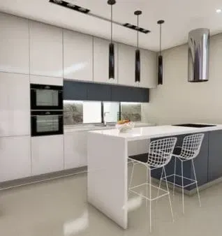 Modern kitchen with white cabinets, a white island with two bar stools, and black pendant lights.