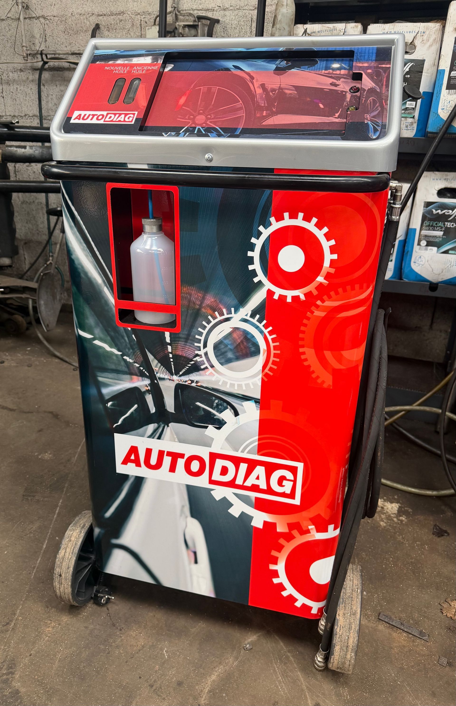 Machine à vidange pour les véhicules à boîte automatique.