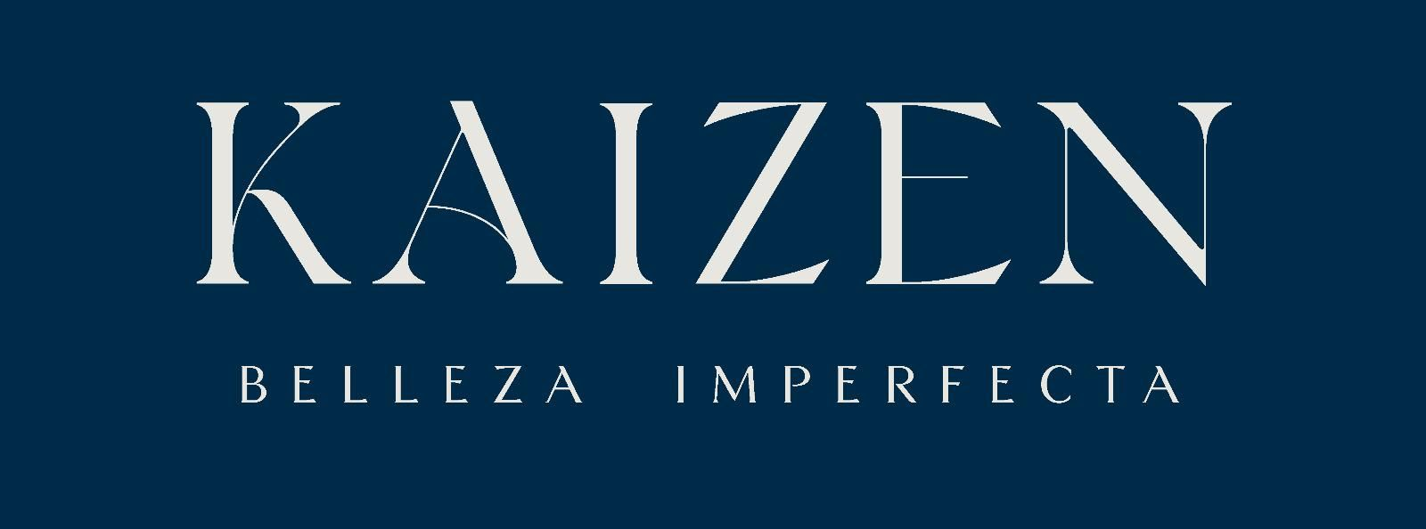 Logotipo de KAIZEN en azul oscuro con las palabras &ldquo;BELLEZA IMPERFECTA&rdquo; debajo.