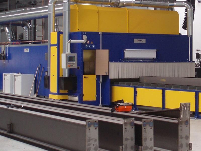 Eine blau-gelbe Maschine mit dem Wort „hx“ darauf