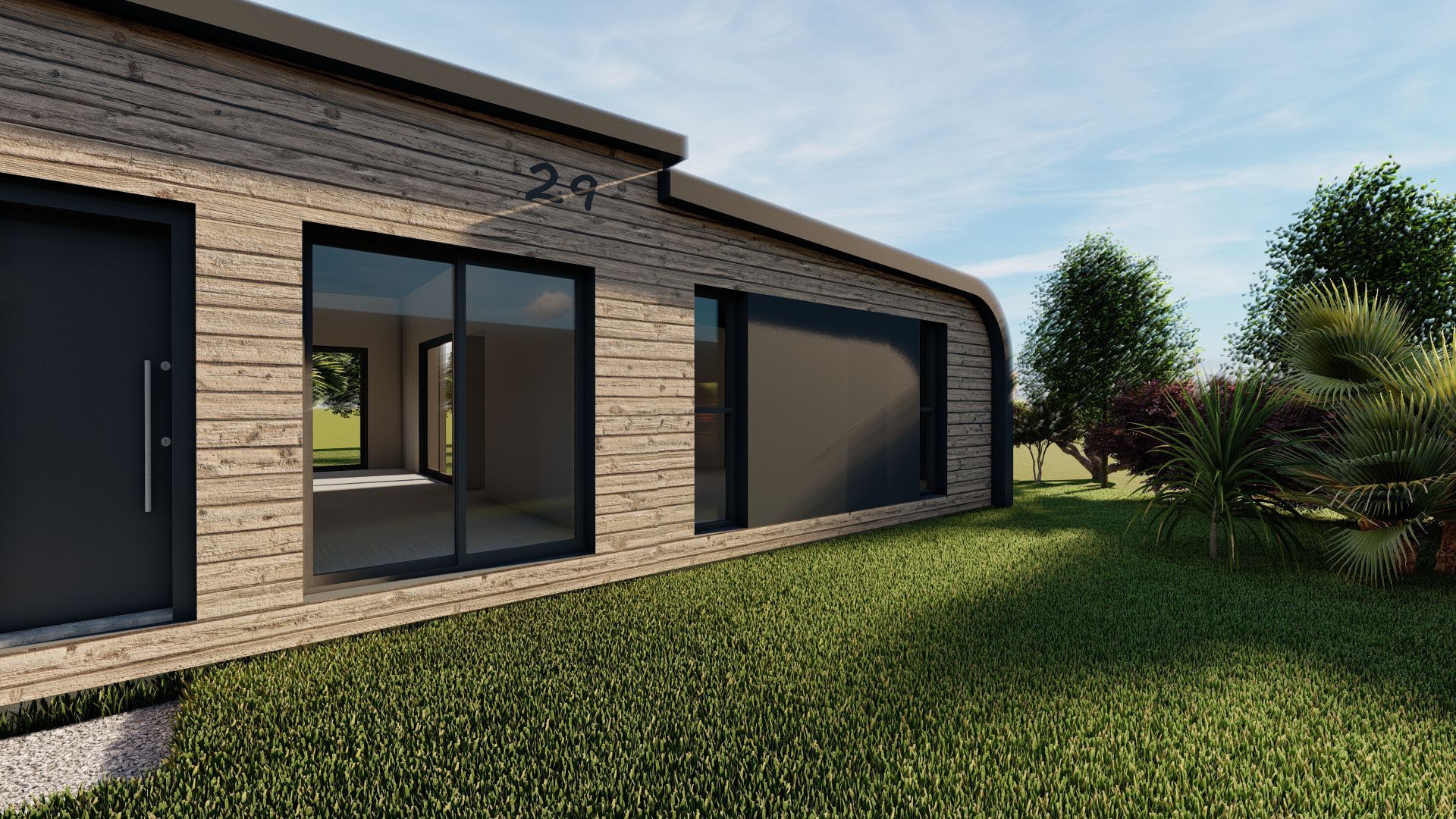 Maison moderne en briques avec de grandes fenêtres sombres et un jardin gazonné bordé d'arbres.