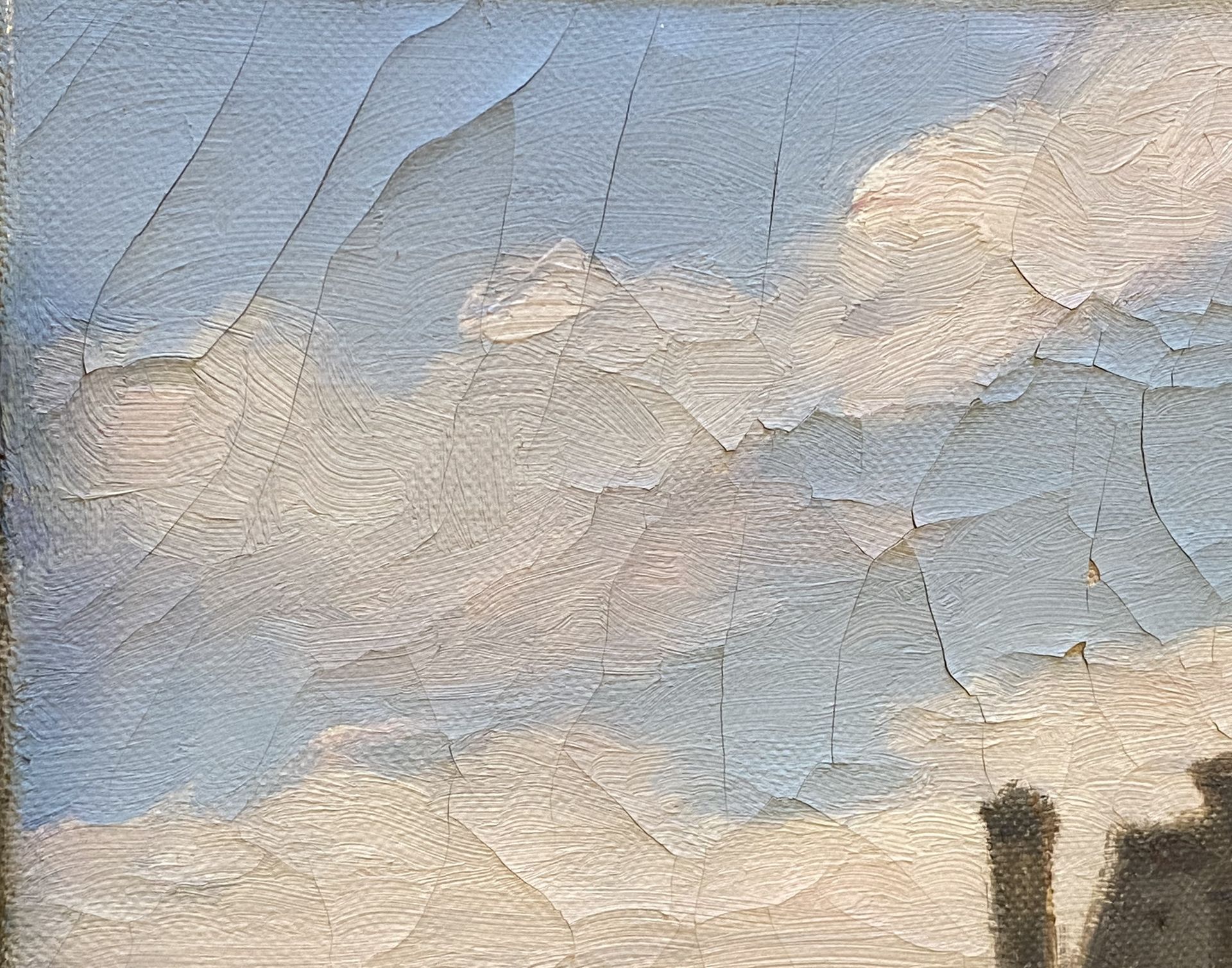 Ciel bleu avec des nuages blancs en peinture écaillée