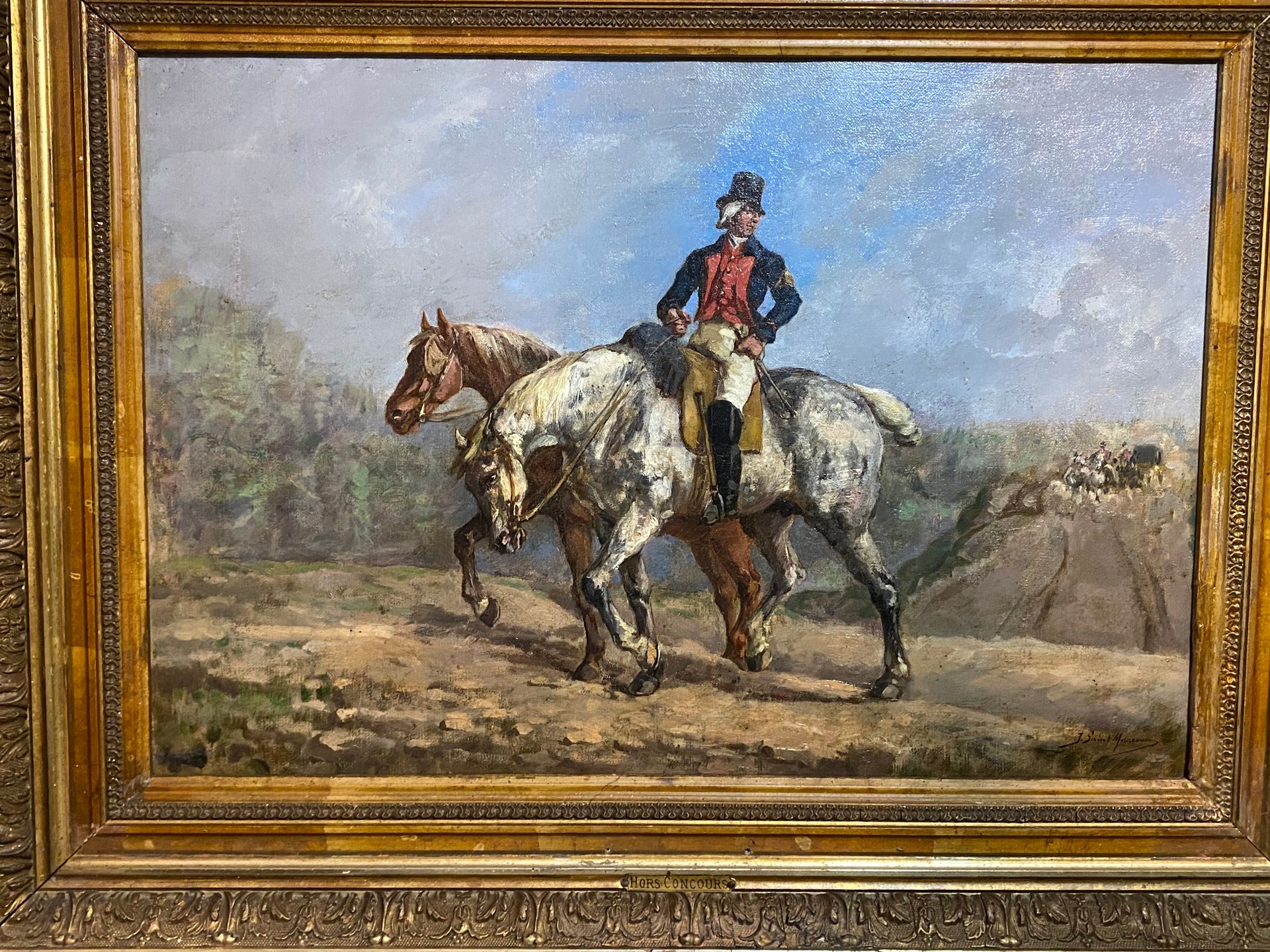 Tableau représentant un homme avec deux chevaux dans un cadre doré