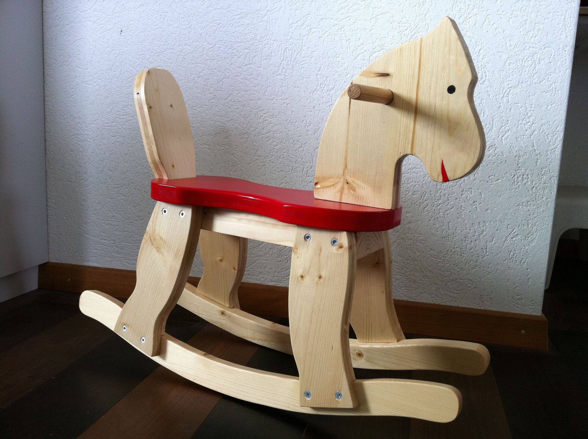 Stump AG Holzbau - Schaukelpferd