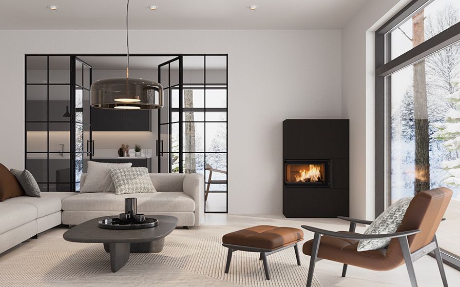 Poêle de masse dans le coin d'un salon de couleur noire