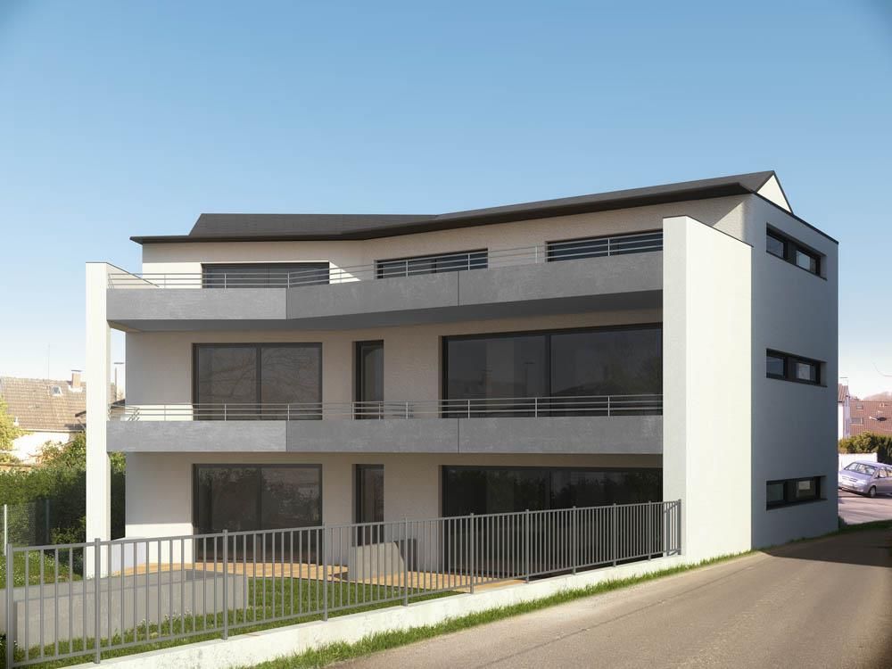 Ein großes weißes Gebäude mit einem Zaun darum