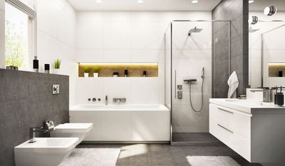 Salle de bains moderne blanche et grise, avec baignoire, douche à l’italienne, bidet et meuble-vasque, dans un style minimaliste lumineux.