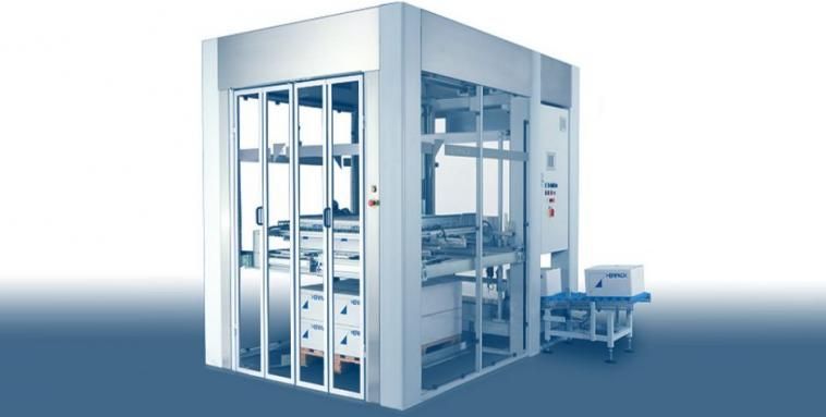 Enceinte industrielle blanche avec portes vitrées dans un environnement de laboratoire ou d'usine propre