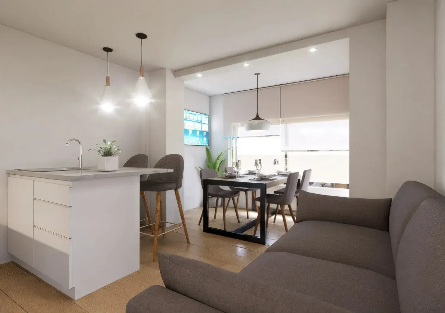 Un salón moderno de planta abierta en tonos neutros, con isla de cocina, mesa de comedor y sofá gris.