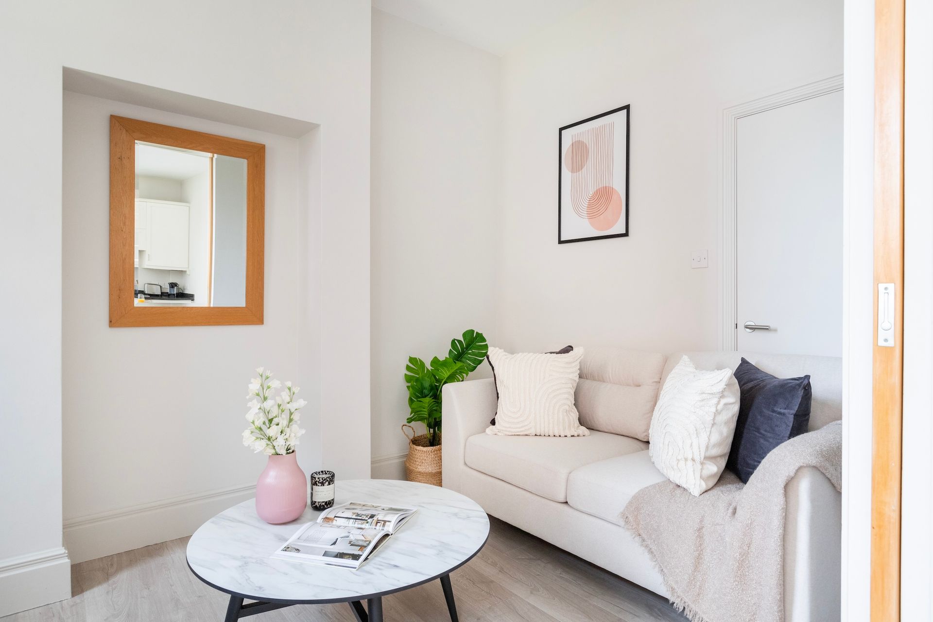 A living room with a couch and a coffee table