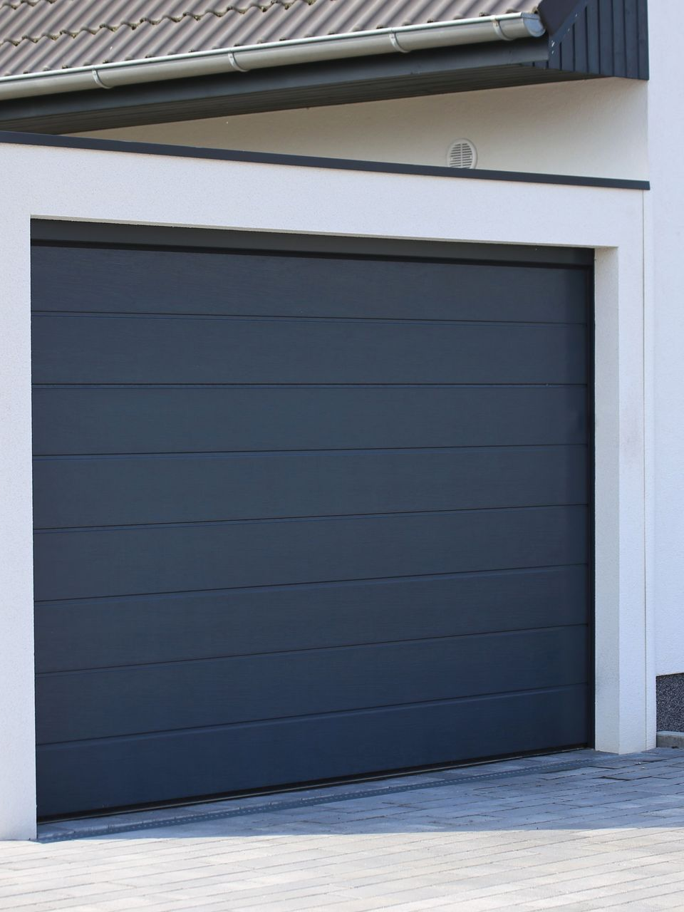 Porte de garage enroulante grise