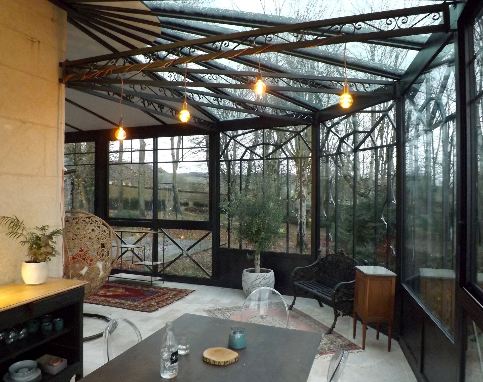 Véranda avec parois vitrées