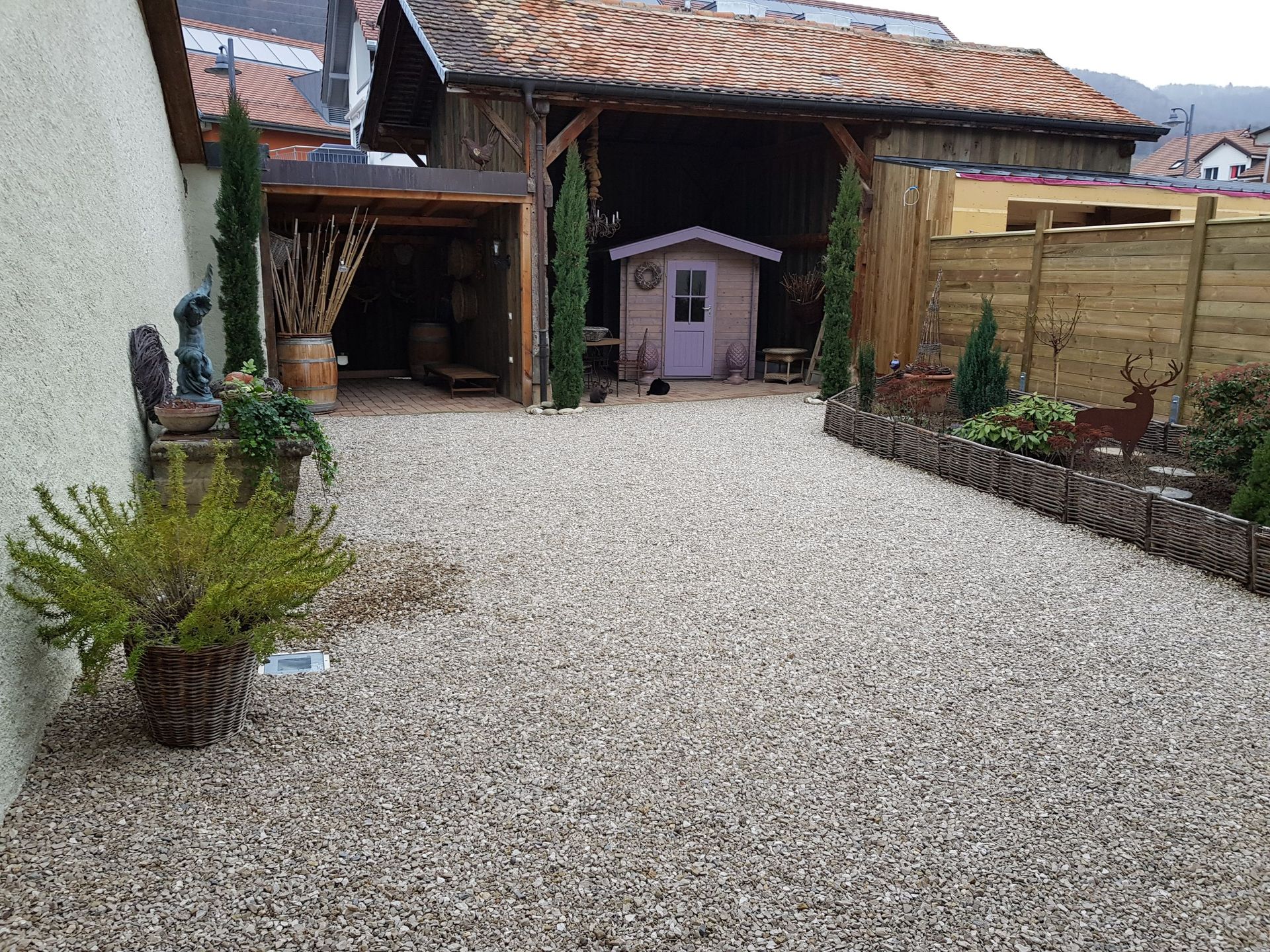 Aménagement minéral plantation et montage du cabanon - Passiflore Jardin Sàrl