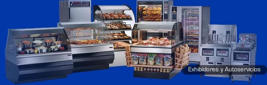 Un montón de electrodomésticos de acero inoxidable sobre un fondo azul.