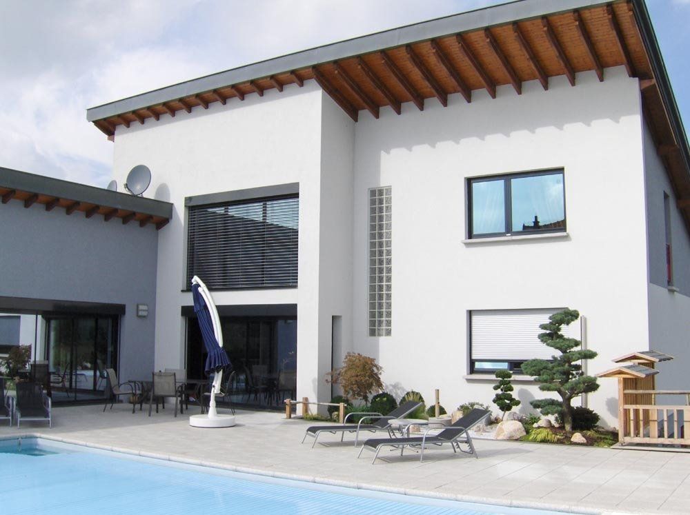 Maison avec piscine vitrée