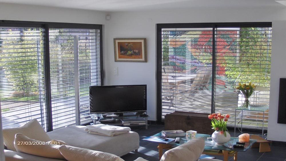 Volets coulissants et brise-soleil