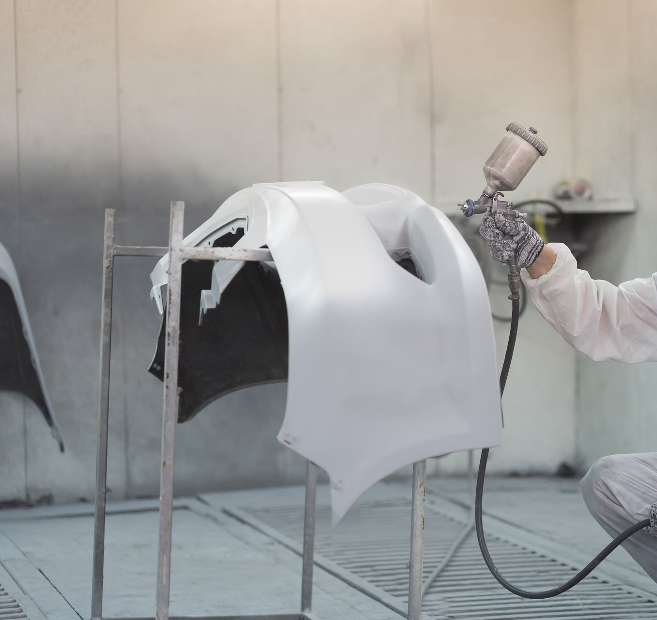 Peinture d'une pièce de carrosserie