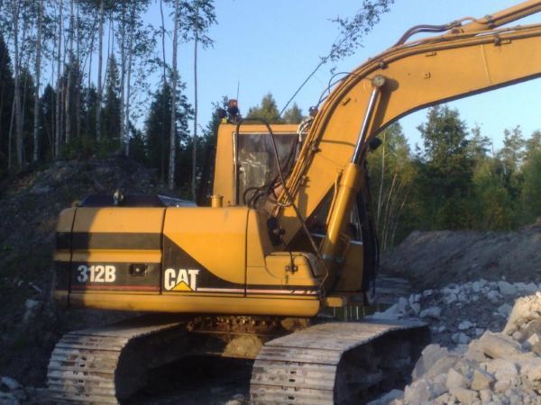  keltainen kaivinkone
