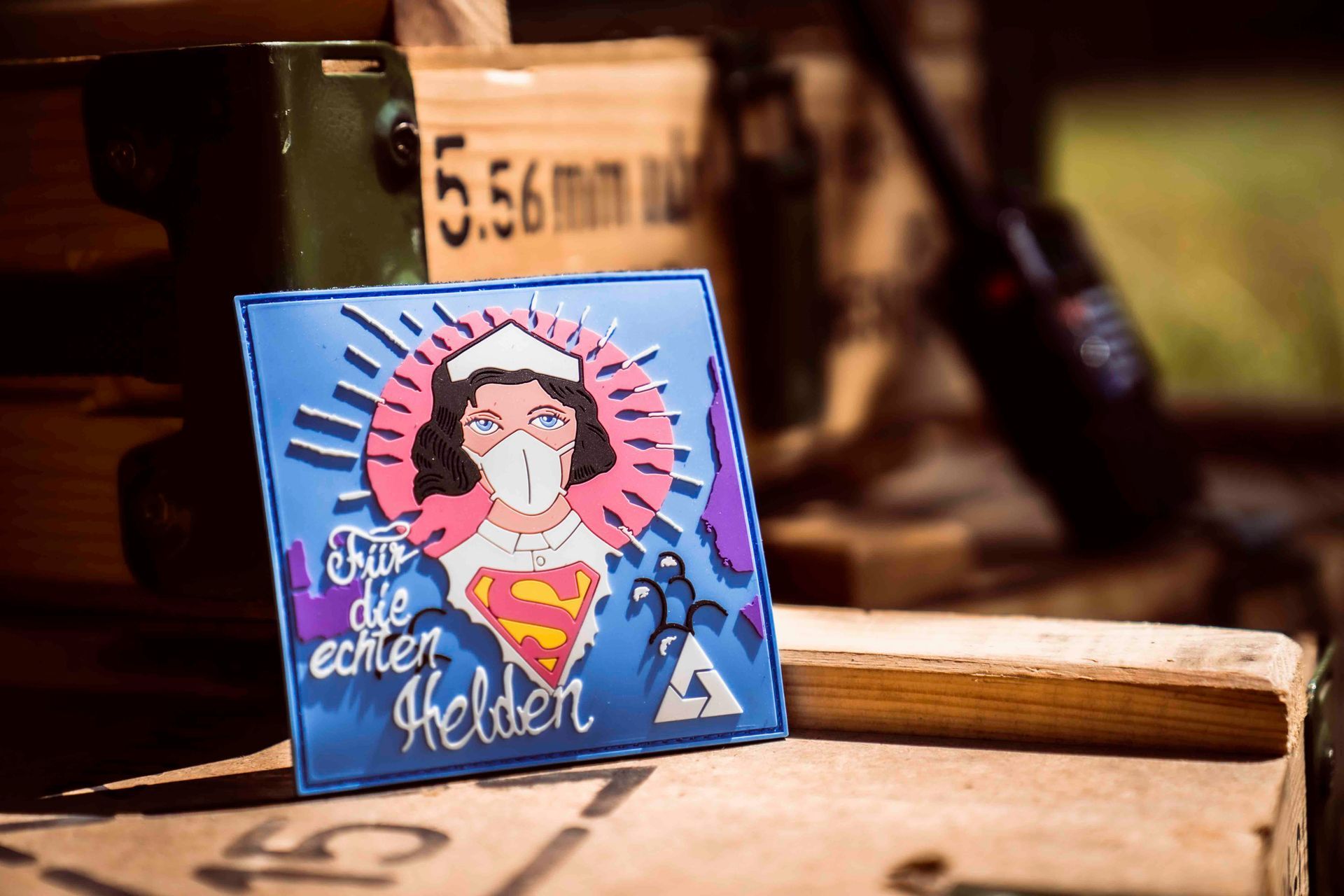 Patch with a nurse in a superhero pose and the text 