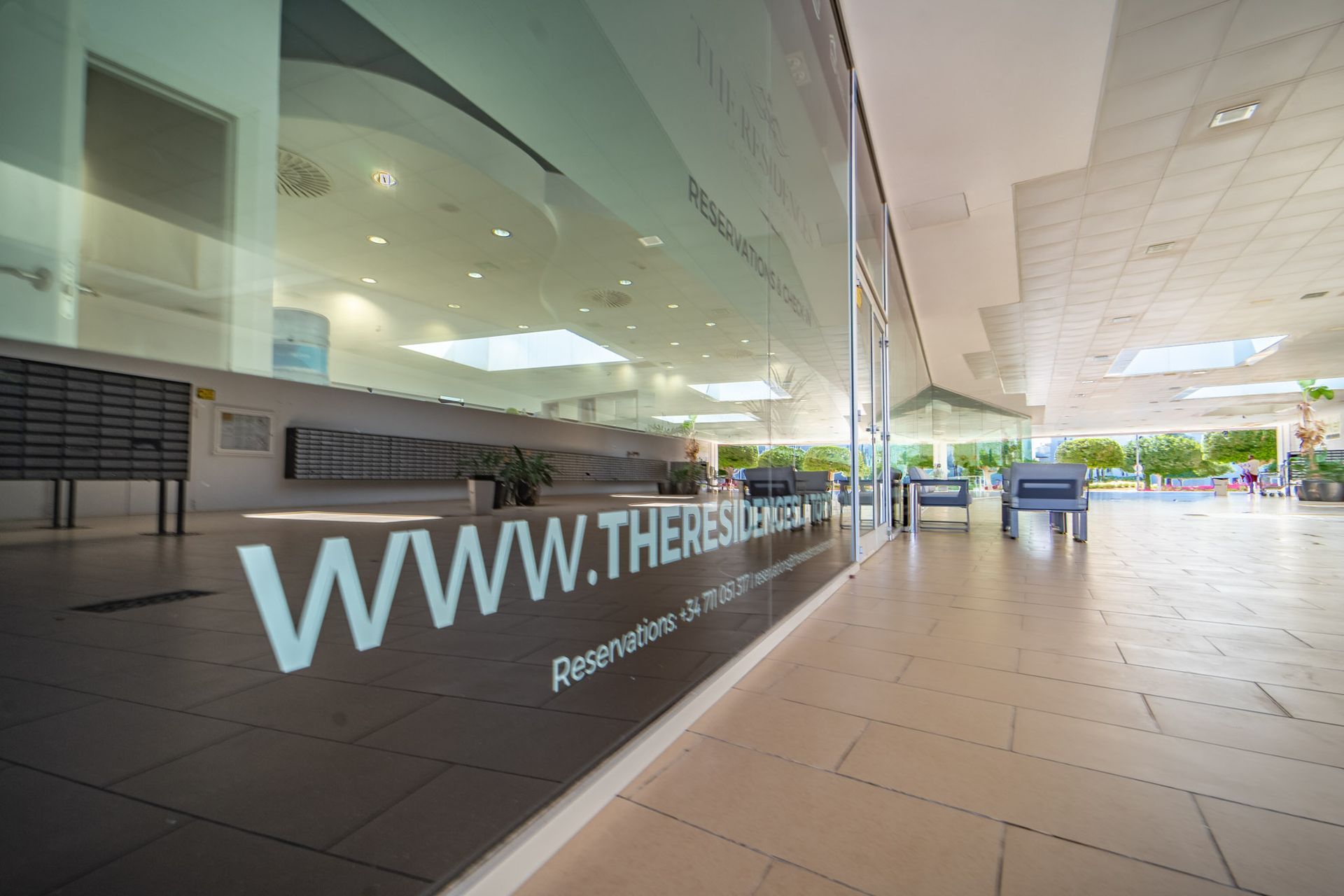 A building with a sign that says www.there.com