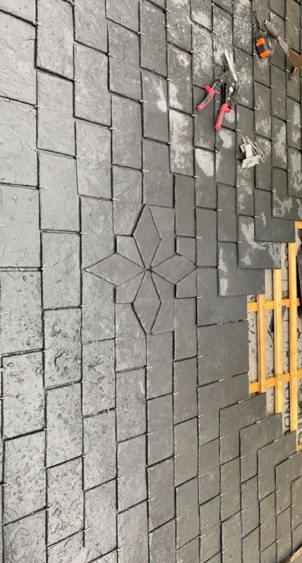 Rénovation d'un toit en ardoises