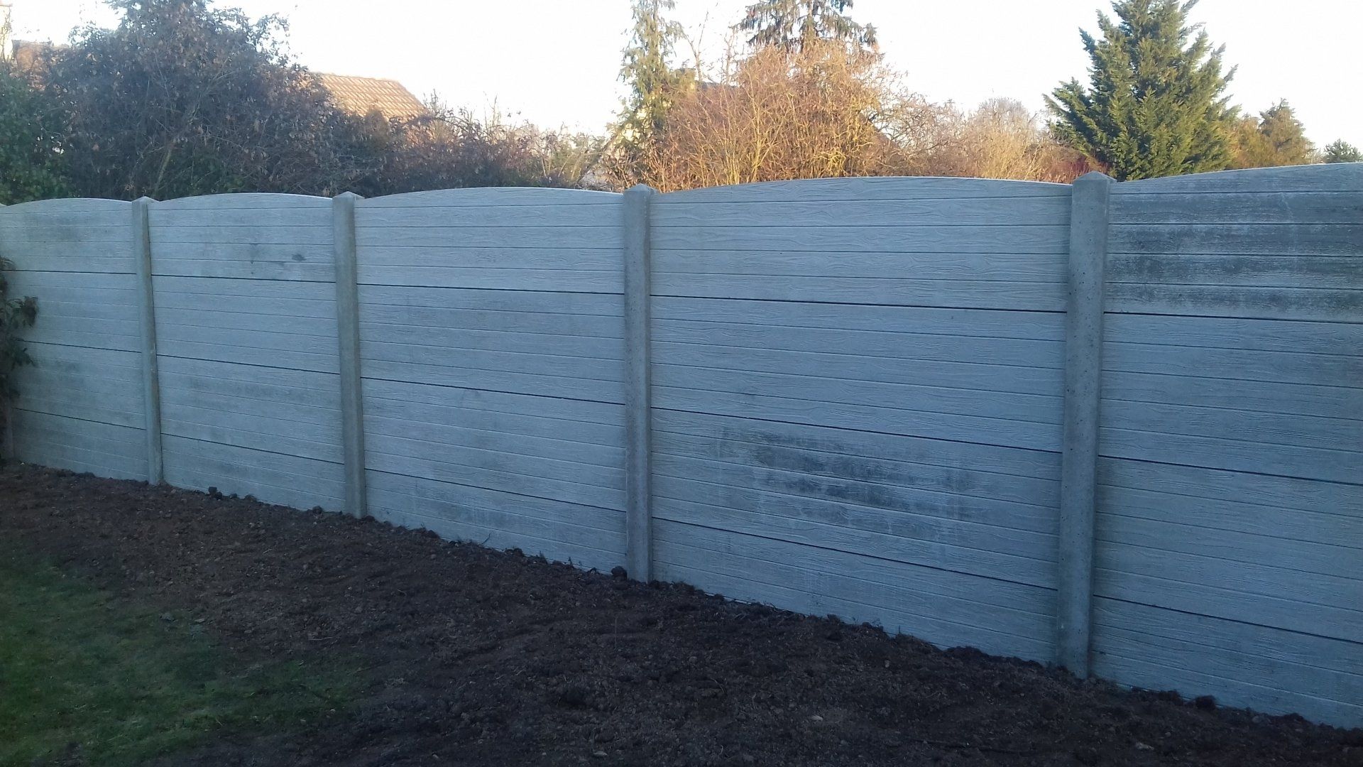 Clôture béton imitation bois