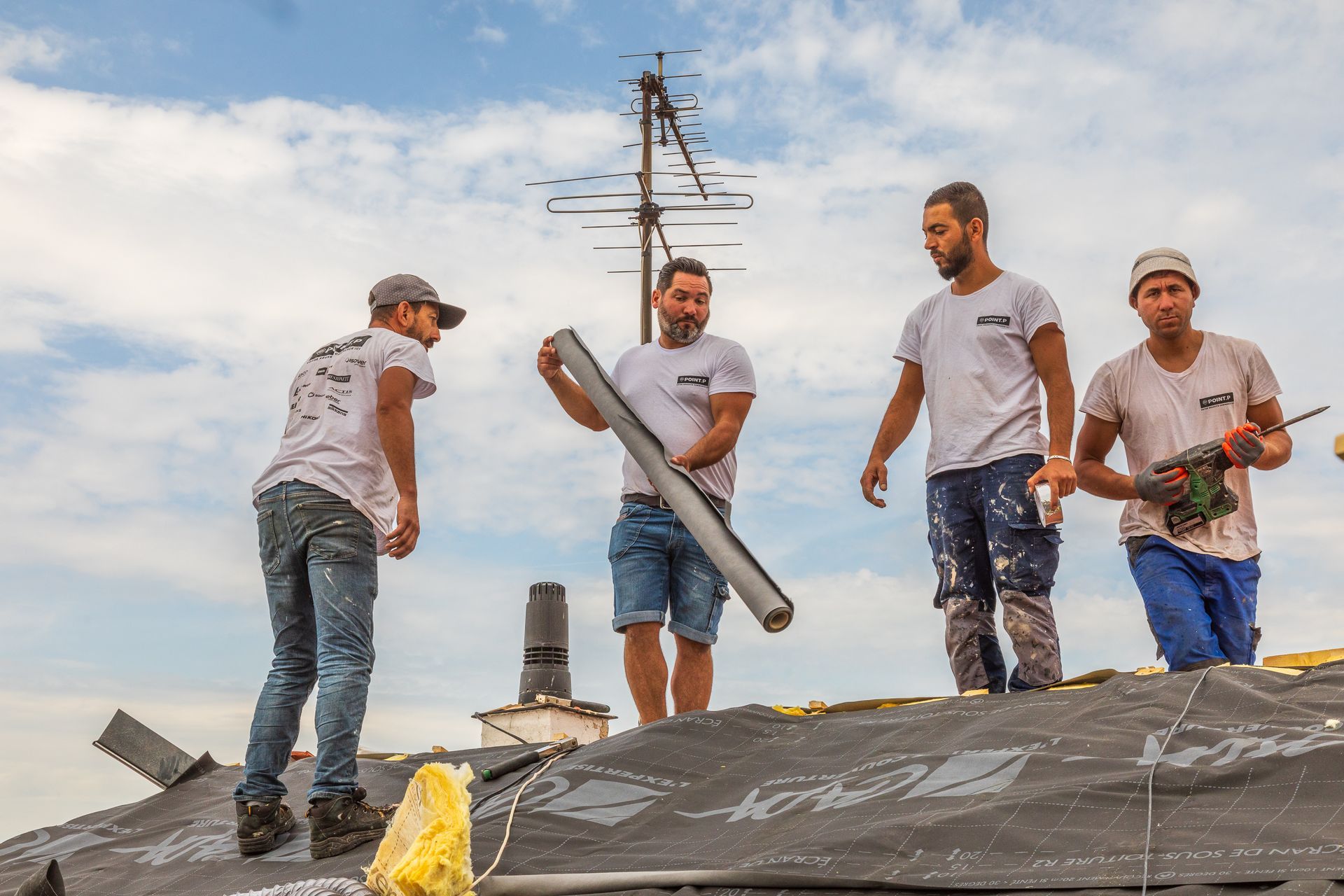 Equipe Angelo Violet sur un toit