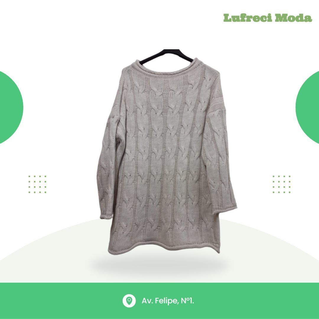 Un suéter de punto cable de color gris claro, de manga larga