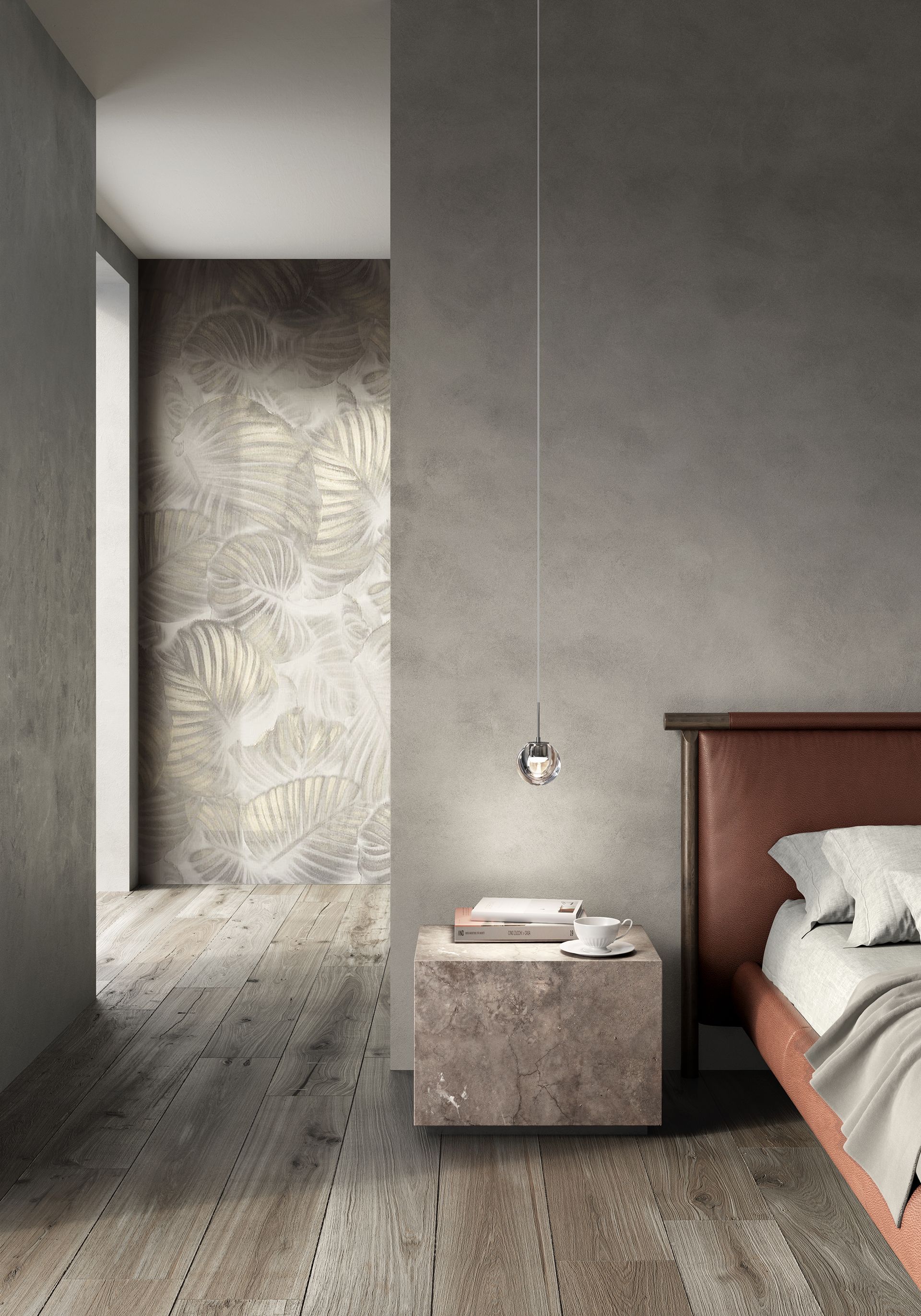 Schlafzimmer mit Nachttisch aus Beton, Hängelampe und braunem Kopfteil vor strukturierten grauen Wänden.