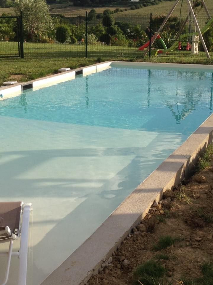 Piscine creusée avec plage