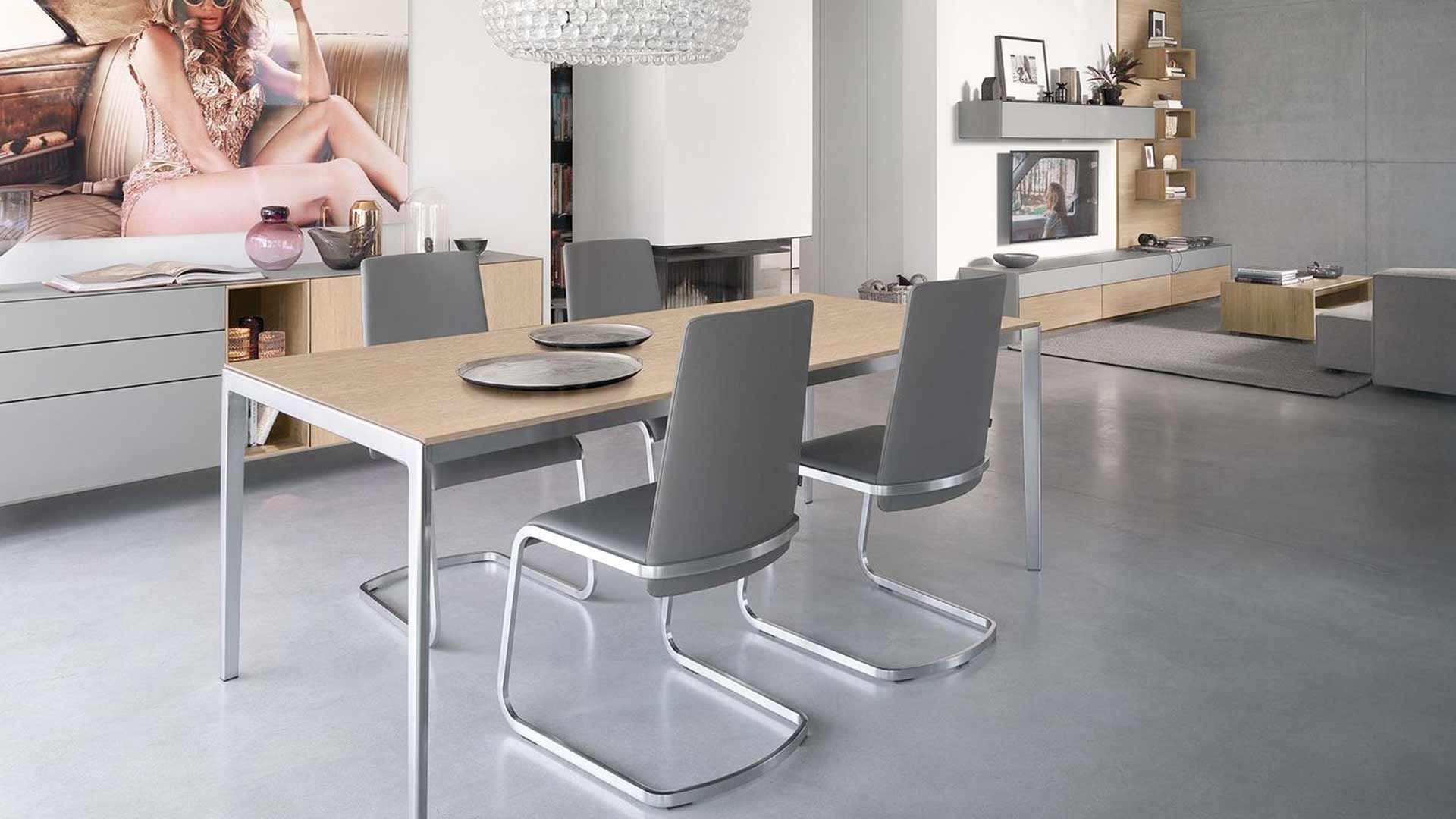 Esszimmer mit angrenzendem Wohnzimmer  von TEAM 7