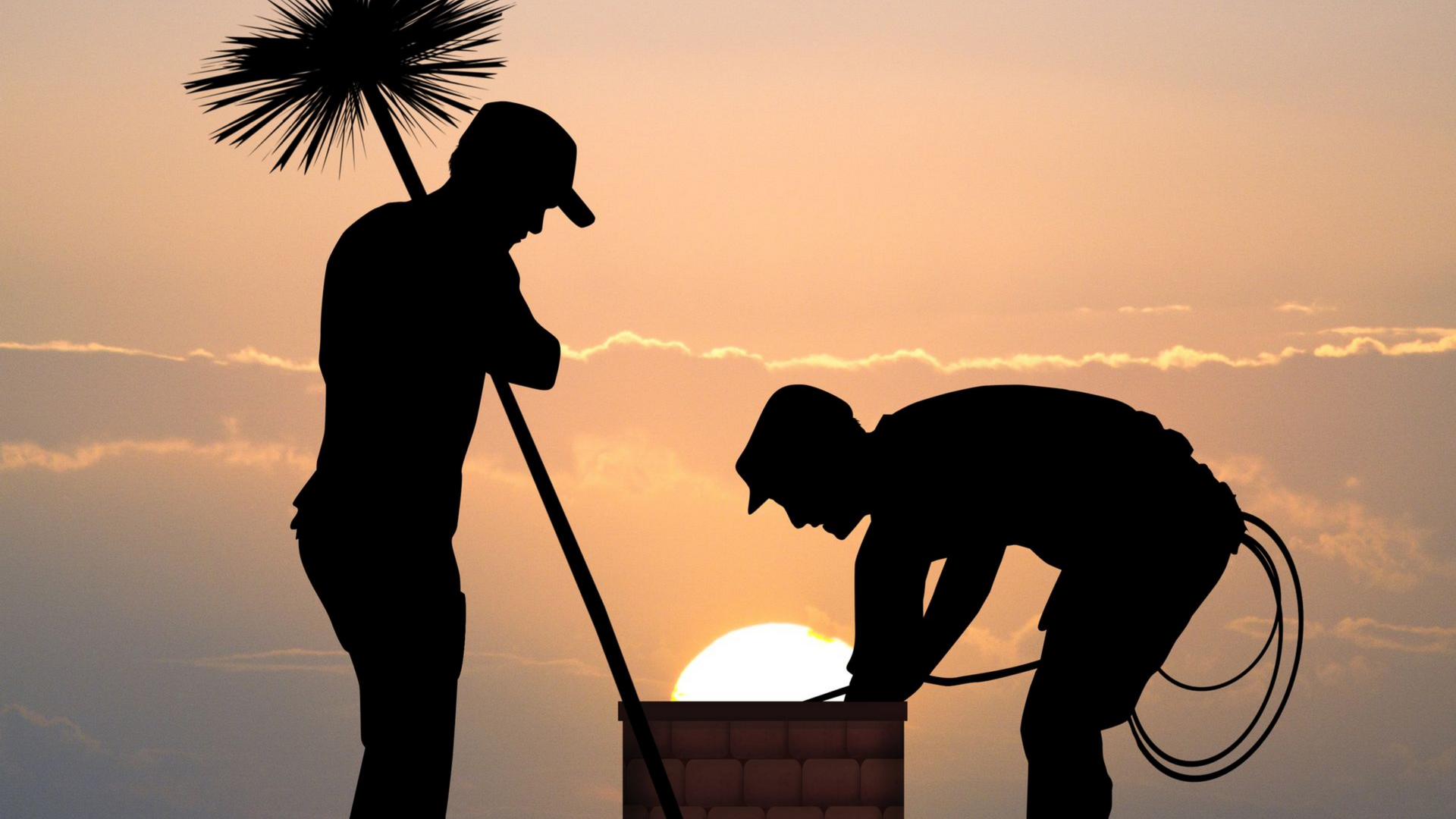 2 hommes qui ramonent une cheminée