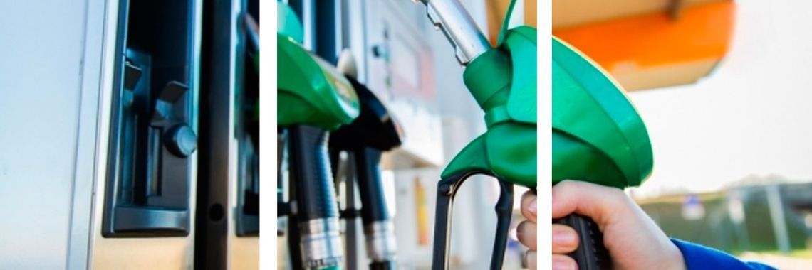 Una persona está cargando gasolina a un automóvil en una gasolinera.