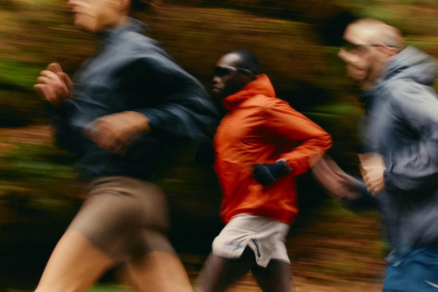 Placeholder: three people running together
