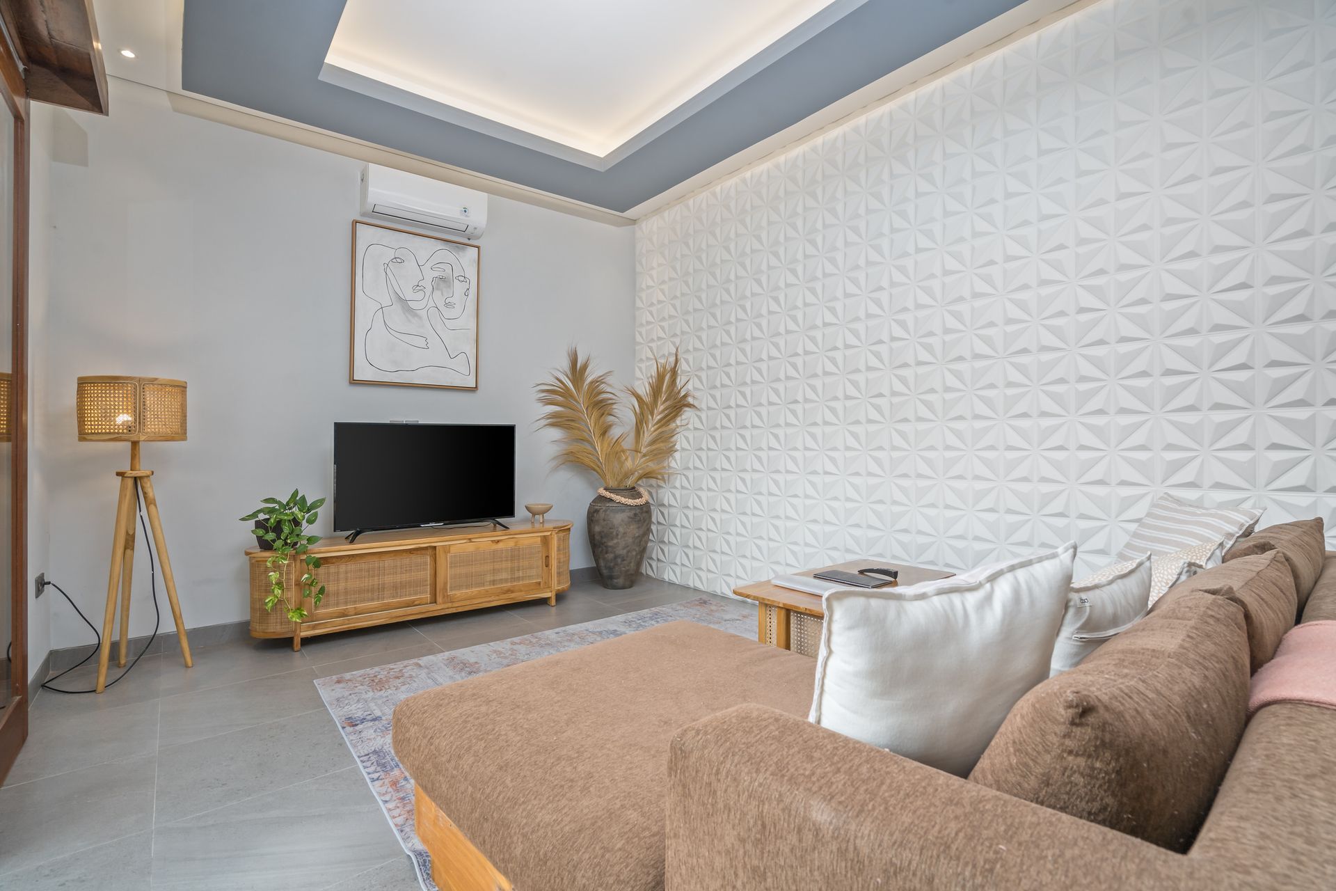 Bright villa living room opening onto a private pool terrace